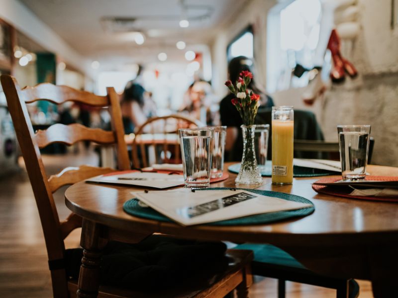 restaurant table decor with some flower